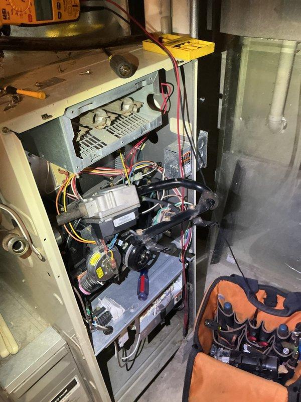 Diagnosed 24-year-old Bryant natural gas furnace blowing cold air due to failed igniter. Multimeter testing confirmed igniter failure. Replaced igniter, restoring proper heat function. System inspection showed secondary heat exchanger remains operational at this time. Discussed equipment age and replacement options with homeowner.