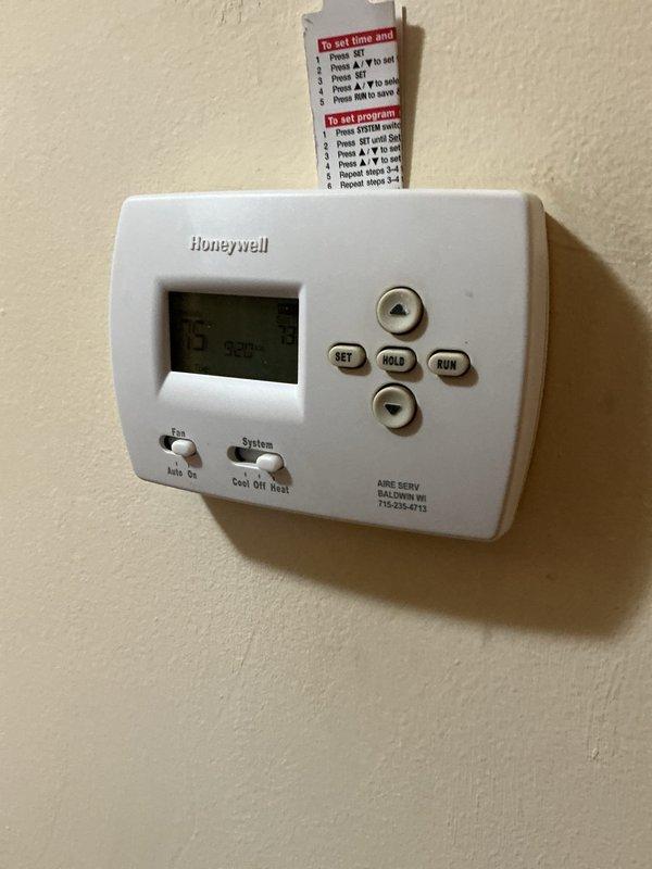 Installed customer-supplied Honeywell digital programmable thermostat, replacing previous unit. System tested and confirmed operational with proper temperature display. Customer will complete Wi-Fi setup independently.