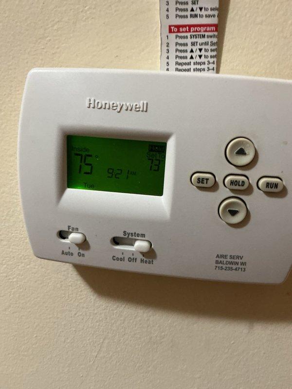 Installed customer-supplied Honeywell digital programmable thermostat, replacing previous unit. System tested and confirmed operational with proper temperature display. Customer will complete Wi-Fi setup independently.