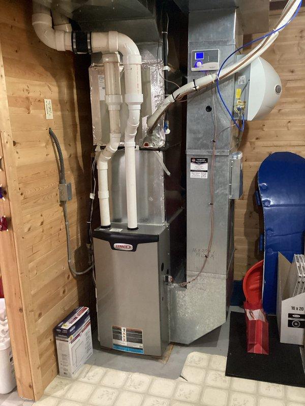 Performed annual FRP furnace tune-up on Lennox system. Completed comprehensive inspection including electrical components, heat exchanger surfaces, and venting system. Measured gas pressure and temperature rise (50°), verifying all parameters within specifications. Replaced customer-supplied dirty air filter, confirmed humidifier pad was clean, and set humidifier damper to winter position. System operated normally during 20-minute test cycle with all components functioning properly.