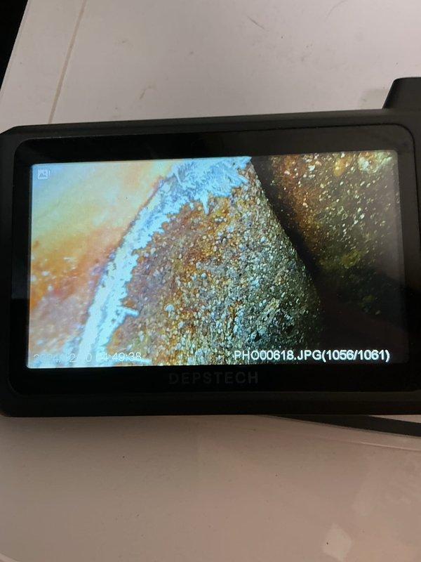 Diagnosed and serviced 34-year-old Tempstar furnace that was failing to maintain heat. Inspection revealed the control board was shorting out, causing interruption of the gas valve operation and preventing the pilot light from staying lit. Replaced failed ignition control board to restore proper system operation.