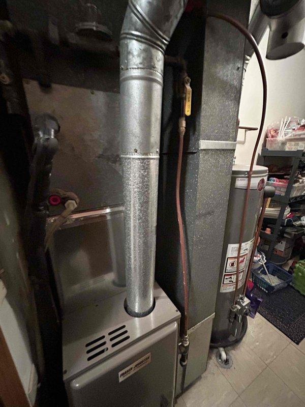 Responded to no heat call for aging furnace that would either not heat above 60°F or would drastically overheat beyond setpoint. Diagnosed issue as dirty flame sensor causing improper system operation. Cleaned flame sensor, conducted system testing, and verified proper heating function restored.