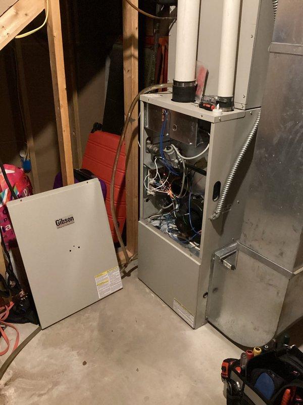 Diagnosed intermittent furnace operation caused by flame sensor issues and high limit code trips. Cleaned flame sensor, verified condensate drainage, and checked pressure switches/hoses. Identified primary causes as restricted airflow from plugged evaporator coil and blocked return vent. Cleaned evaporator coil and installed new return in the blocked-off hole to restore proper system operation.