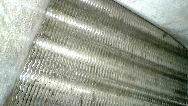 Diagnosed intermittent furnace operation caused by flame sensor issues and high limit code trips. Cleaned flame sensor, verified condensate drainage, and checked pressure switches/hoses. Identified primary causes as restricted airflow from plugged evaporator coil and blocked return vent. Cleaned evaporator coil and installed new return in the blocked-off hole to restore proper system operation.