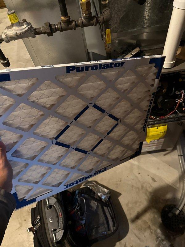 Completed furnace maintenance on a 13-year-old unit (2012 model, installed 2014). Inspected system and found it running properly with no operational issues. Replaced heavily clogged air filter with a new Purolator filter to restore proper airflow. System is functioning correctly after service.