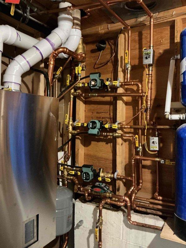 Responded to warranty service call for recently installed IBC boiler (20 days old). Customer reported insufficient hot water supply and inadequate heating on main floor despite thermostat settings. Diagnosed circulation issue in water heater zone and increased pump speed to resolve hot water depletion problem that was occurring after approximately 20 minutes of use.