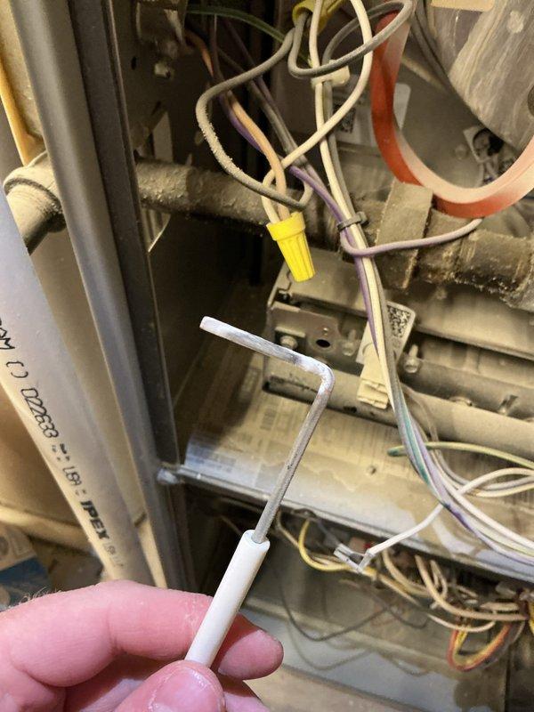 Responded to no heat complaint on furnace where system would ignite but flame would extinguish after 10-15 seconds. Diagnosed dirty flame sensor causing improper flame detection. Performed cleaning of flame sensor, restoring normal system operation and heat production.