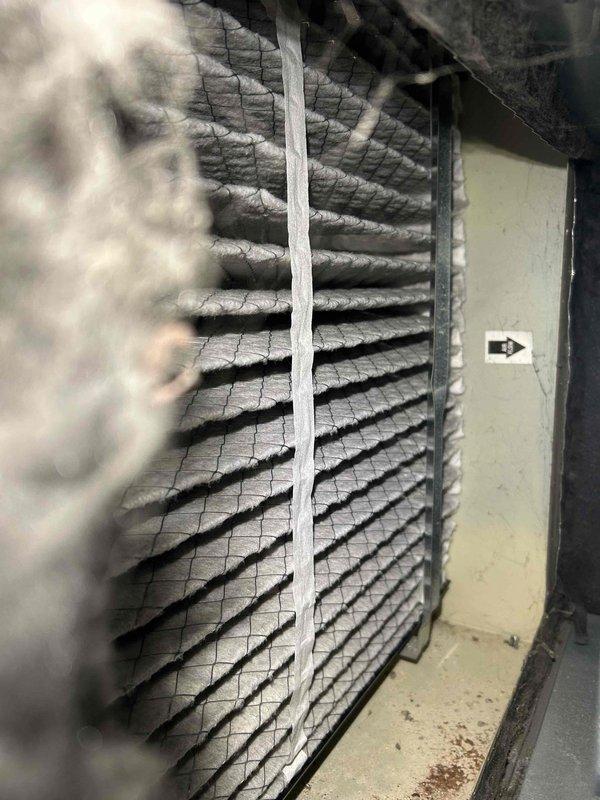 Performed annual furnace tune-up on 9-year-old unit that had previous ignitor issues. Cleaned heavily contaminated air filter and flame sensor, which were causing operational problems. Conducted combustion analysis with Testo 310 II analyzer to verify proper functioning. Unit now operating within normal parameters.