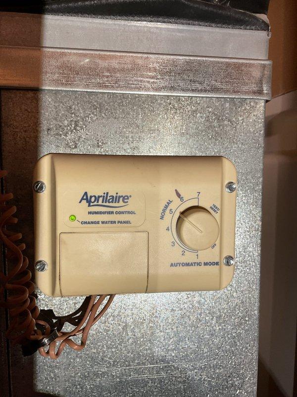 Performed comprehensive furnace inspection on 15-year-old unit running at reduced efficiency (88.4% vs rated 92%). Identified heat exchanger showing stress with possible pinhole deterioration and inducer motor bearings exhibiting wear. Inspected Aprilaire humidifier system and documented condition. Discussed aging equipment concerns with homeowner for future consideration.