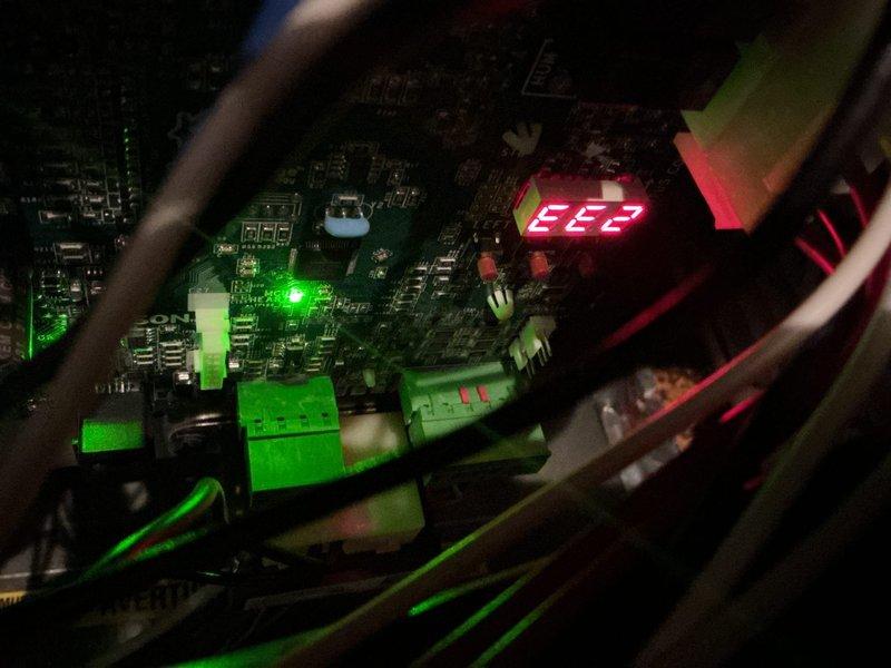 Responded to no-heat call for 1-year-old furnace that was attempting to cycle but failing to operate consistently. Diagnostic testing revealed error code EE2 on control board and a failed inducer motor. Replaced inducer motor under existing parts warranty, restoring normal furnace operation and heat to the home.