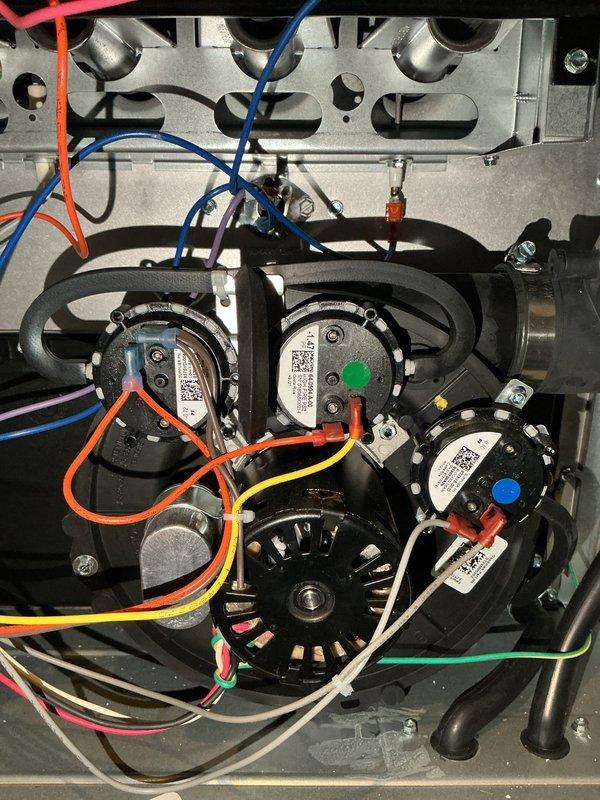 Responded to no-heat call for 1-year-old furnace that was attempting to cycle but failing to operate consistently. Diagnostic testing revealed error code EE2 on control board and a failed inducer motor. Replaced inducer motor under existing parts warranty, restoring normal furnace operation and heat to the home.