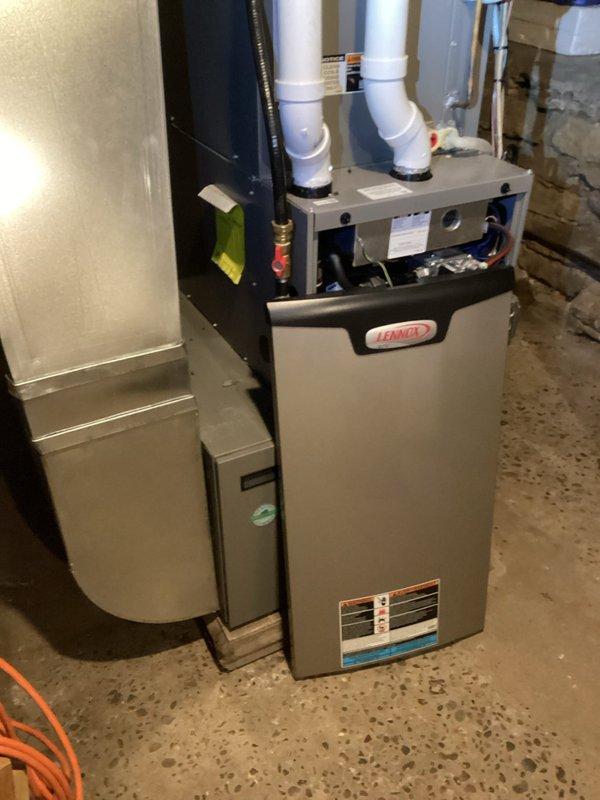 Responded to customer complaint of furnace not maintaining desired temperature. Inspected Lennox system, verifying LP supply, checking components, ensuring proper condensate drainage, and confirming clear venting. Observed slightly dirty filter but determined this was likely not causing the issue. After 20-minute test run, system operated without problems. Installed customer's new filter and advised to monitor for recurrence.