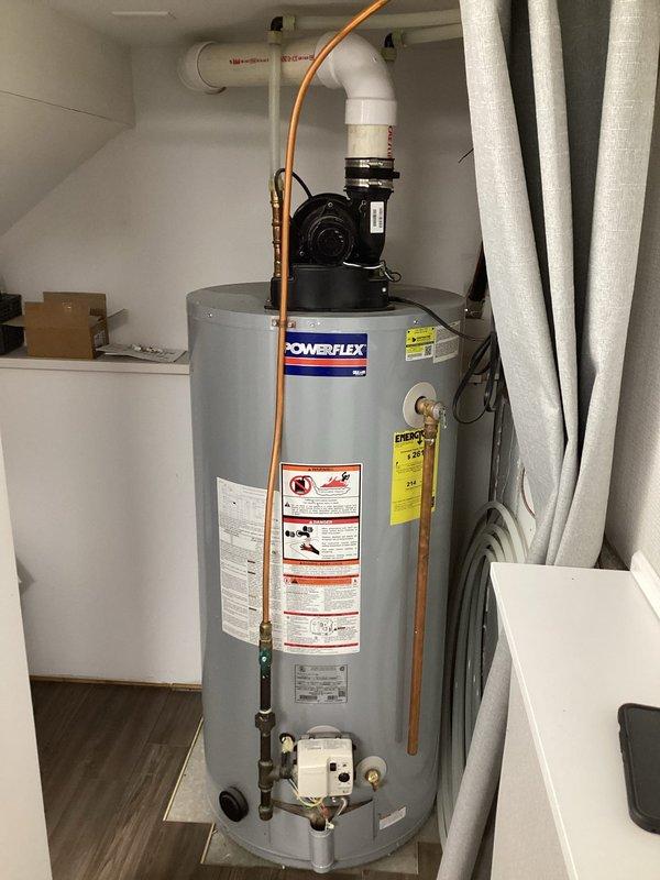Performed diagnostic assessment on 12-year-old PowerFlex gas water heater that had previously stopped producing hot water. Customer had reset unit but status light continued flashing. While heater was operational at time of service, I confirmed error code persisted and documented age-related wear. Provided comprehensive replacement options, including tankless alternatives as requested by customer.