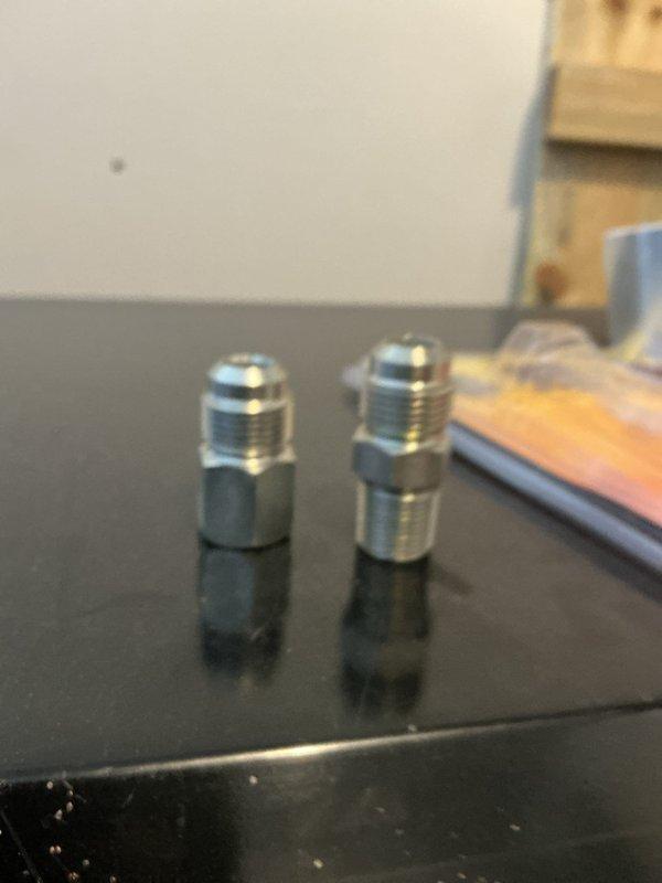 Connected gas line to customer's garage heater using black iron pipe to join with existing copper line. Performed leak testing to ensure safety and proper functionality. Customer-supplied appliance whip was unsuitable for installation, requiring alternative connection method.