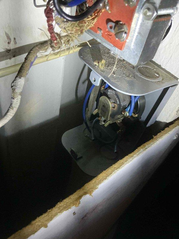 Diagnosed non-functional boiler with no heat output. Inspection revealed failed transformer causing control system malfunction. Documented aged condition of unit with visible wiring deterioration and pipe oxidation. Provided customer with estimate for replacement components.