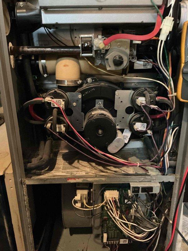 Responded to no heat call for 18-year-old Lennox furnace. Diagnosed stuck high limit switch, temporarily restored operation by manually re-engaging switch through tapping method. Identified root cause as furnace overheating likely due to restrictive filtration. Inspection revealed significant rust and potential heat exchanger breach where primary connects to secondary. Customer opted for temporary repair and scheduled consultation for furnace replacement.