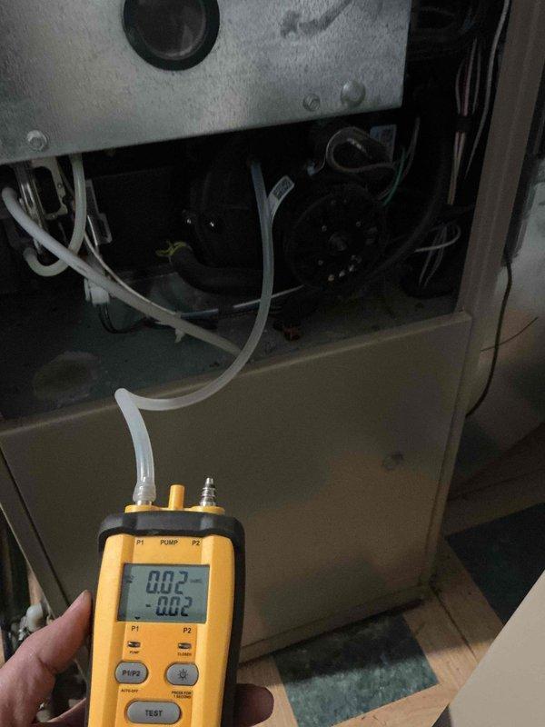 Responded to no-heat call for 26-year-old York furnace. Diagnostic testing revealed a failed draft motor with shaft spinning free of fan wheel, preventing proper vacuum on pressure switches. Inspection also discovered holes in heat exchanger, rendering unit unsafe to operate. Unable to isolate furnace gas supply due to absence of dedicated shutoff valve. Scheduled service advisor follow-up to discuss replacement options.