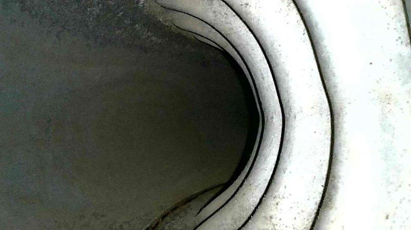 Responded to service call for intermittent furnace operation issue on a 10-year-old Goodman system. Diagnostic testing revealed flame sensor was severely fouled, causing flame sensing failures and resulting in the furnace tripping on flame sense code. Performed complete system tune-up including thorough cleaning of flame sensor, verification of proper condensate drainage, and inspection of heat exchanger (noted minor rust spots but no significant concerns). System was tested after service with proper operation confirmed, achieving 50° temperature rise. Discussed future AC installation options with homeowner.