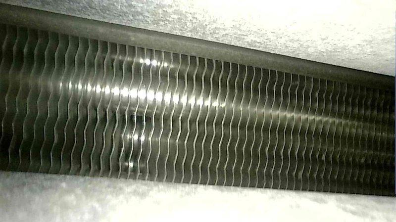 Responded to no heat complaint on an 8-year-old furnace not reaching setpoint temperature (70°F vs. actual 65°F). Upon inspection, discovered heavily soiled air filter restricting proper airflow. Replaced filter and increased fan speed by 10% to improve system efficiency and heat distribution. System operation confirmed normal after adjustments.