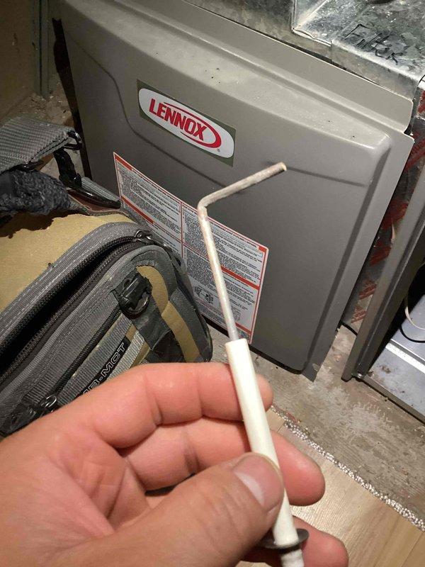 Performed comprehensive tune-up on 3-year-old natural gas furnace. Conducted full inspection including combustion analysis, gas pressure verification, and examination of heat exchanger, which showed signs of corrosion around openings. Cleaned condensation trap and pressure switch, tested flame sensor and burners, and verified proper operation of blower assembly. Thermostat functioning correctly with normal heating performance. Filter in moderate condition. Lennox unit currently operating within normal parameters with no immediate concerns requiring attention.