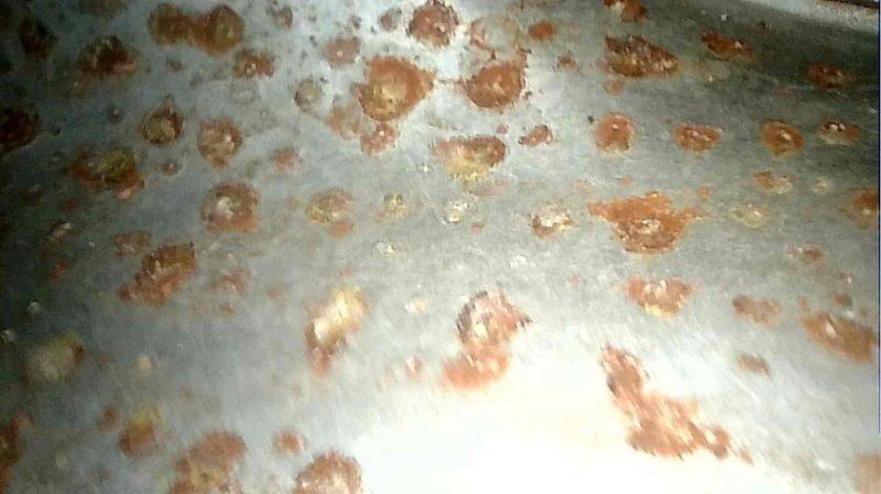 Responded to service call for 30+ year old furnace exhibiting short cycling behavior on the blower motor. Upon inspection, discovered severely corroded and leaking heat exchanger with extensive rust damage throughout the unit. After review with homeowner, replaced aging furnace due to safety concerns and equipment deterioration beyond repair.