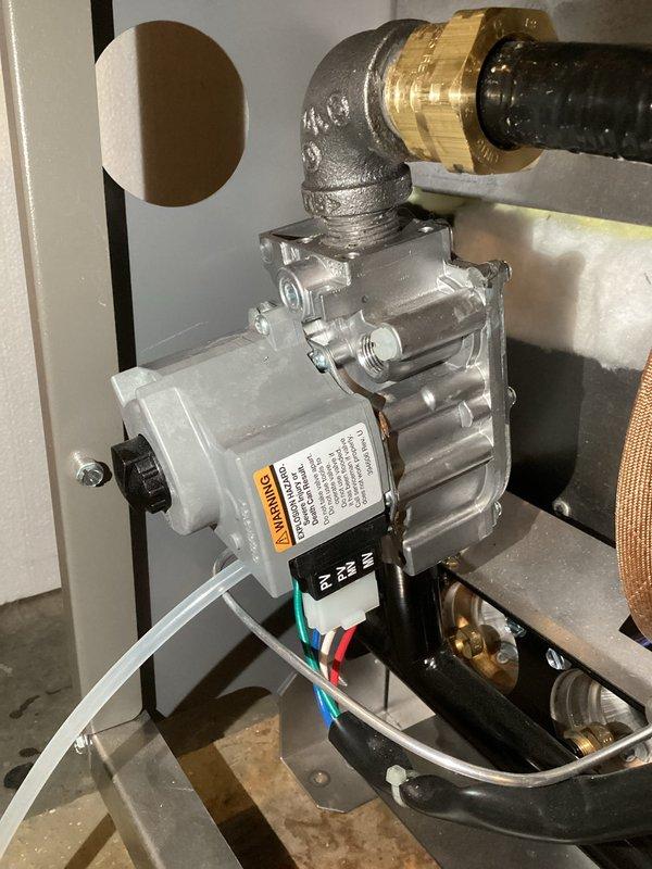 Responded to customer concern of newly installed Lennox WT boiler exhibiting loud banging noises during ignition sequence. Diagnostic testing revealed gas pressure at half the required specification, causing delayed ignition and combustion issues. Informed homeowner to contact gas company for pressure adjustment to resolve primary issue. Preventatively ordered replacement gas valve and pilot control board components as contingency if pressure correction proves insufficient.