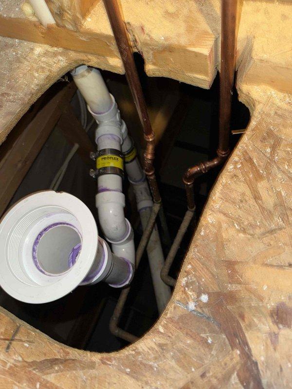 Completed shower remodel including installation of new shower drain and diverter. Repiped both the drain system and water supply lines using PVC with proper primer at joints and secured new plumbing to wall framing with mounting brackets. No inspection or permits were required for this installation.