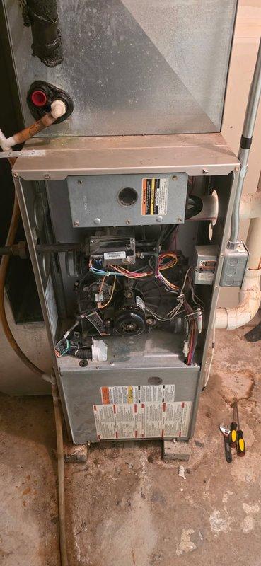 Diagnosed inoperative 2003 Bryant Plus 90 furnace reporting pressure switch error code. Found clogged condensate trap which was cleared, but further investigation revealed leaks in the secondary heat exchanger requiring replacement. After comprehensive system evaluation including ignitor, flame sensor, pressure switch, inducer and blower, scheduled comfort advisor for equipment replacement options.