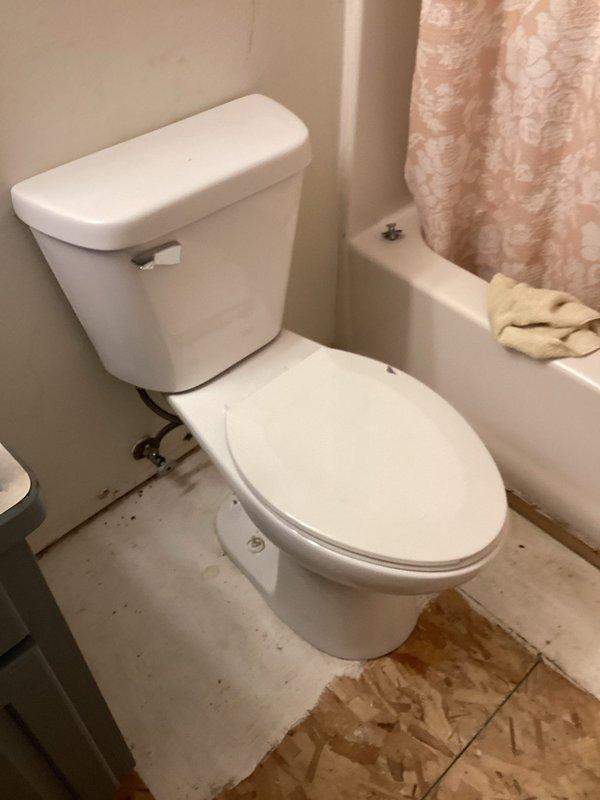 Temporarily reinstalled customer's toilet with new wax seal and proper shimming following previous flooding incident and remediation work. Confirmed proper function of recently purchased toilet components. Customer advised this is an interim installation, with future service required for toilet removal during flooring replacement and final reinstallation once flooring work is complete.
