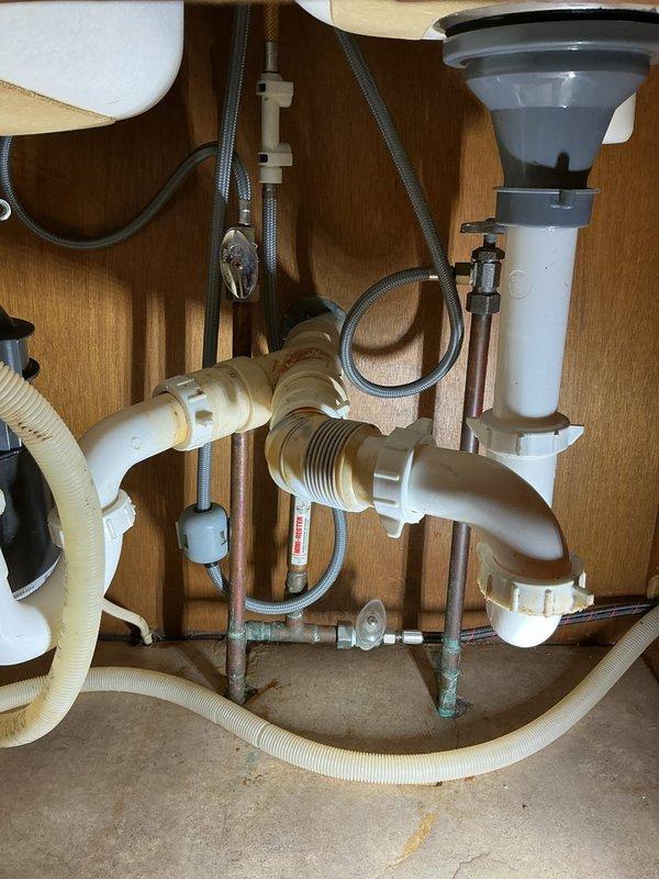 Responded to service call for kitchen sink clog. Located blockage approximately 10 feet down the drain line and successfully cleared using appropriate drain cleaning equipment. Performed flow test after clearing to confirm proper drainage was restored and sink is now functioning properly.