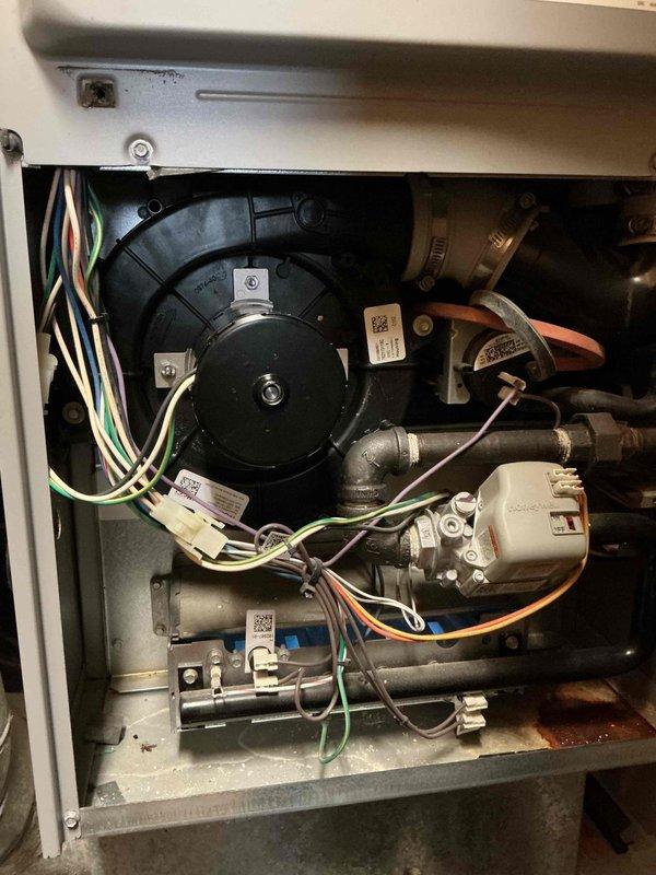 Completed replacement of PSC draft combustion inducer blower assembly in Lennox system as previously sold by Roger. Replaced draft motor, performed operational testing to verify proper ignition and heating function, and confirmed all other system components operating correctly.
