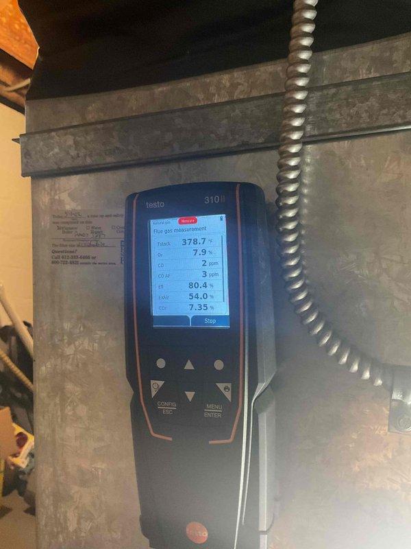 Performed diagnostic assessment on aging system (10+ years) due to heat failure. Conducted thorough combustion analysis with Testo gas analyzer showing acceptable CO levels but identified visual evidence of a possible cracked heat exchanger. System was red-tagged for safety concerns after confirmation of heat exchanger integrity issues. Discussed findings with customer, recommending system replacement due to age and potential safety hazards.