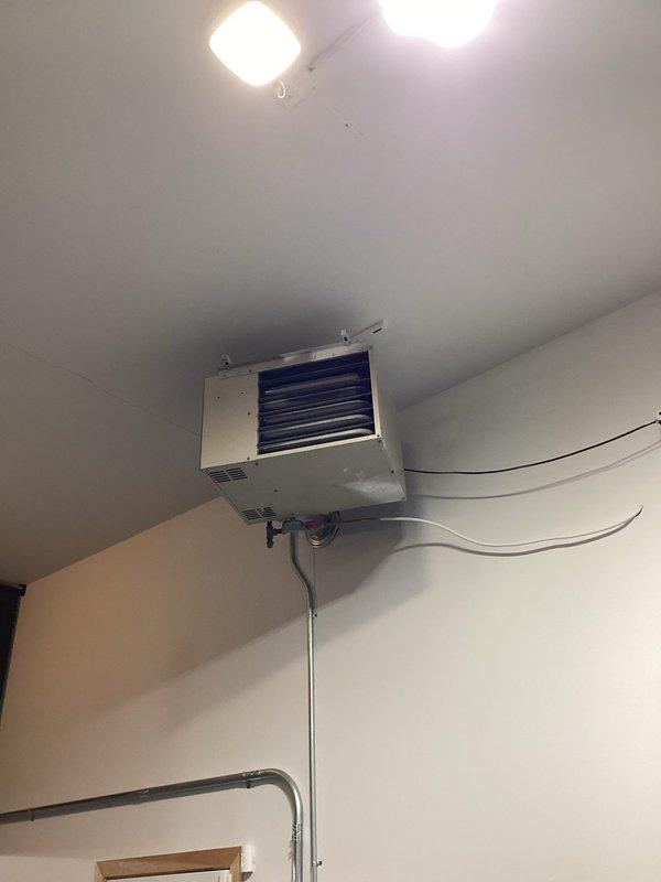 Diagnosed garage heater failure where unit was turning on but not igniting. Identified failed high limit switch as root cause in this 3-year-old system installed by previous company. Submitted warranty information to parts department who will follow up with pricing for replacement part installation.