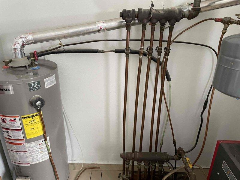 Performed second opinion assessment of existing boiler system. Identified need for separate venting systems for power vent boiler and water heater, with recommendation to install a chimney liner for the boiler. Customer elected to maintain current configuration despite recommendations. Prepared and submitted estimates for power vent water heater replacement for future consideration.