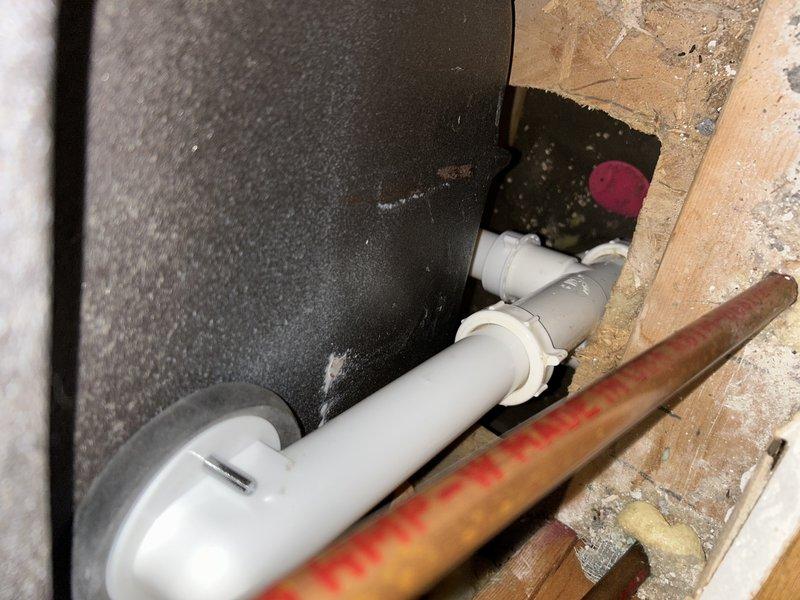 Responded to a water leak complaint originating from upstairs bathroom shower and extending to basement. Diagnostic inspection revealed water intrusion through ceiling when bathtub/shower was in use. Located defective tub waste and overflow assembly. Successfully replaced tub waste and overflow components, effectively resolving the leak issue.