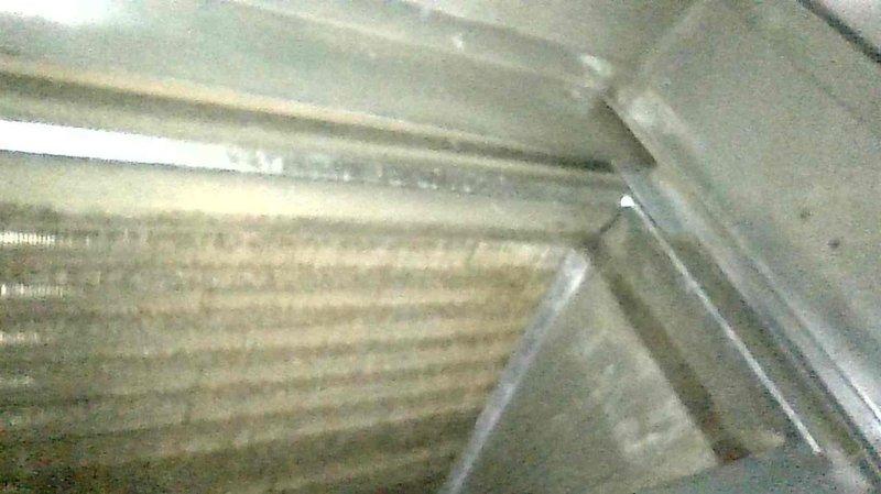 Completed bi-annual maintenance service on residential furnace for reward membership customer. Performed comprehensive inspection including heat exchanger verification, burner assessment, flame sensor cleaning, and condensate system check. Unit is functioning properly with no defects observed in critical components.