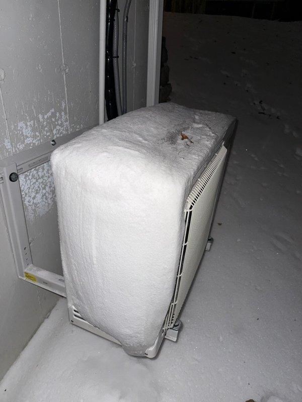 Responded to warranty service call for Mitsubishi mini-split system in detached garage exhibiting no heat operation. Diagnosed severe ice accumulation on outdoor unit due to failed thermistors. Replaced defective thermistors under warranty, restoring proper system operation and resolving the abnormal frost buildup condition.