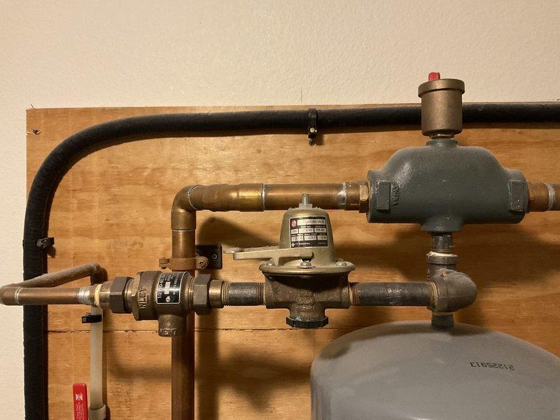 Responded to a customer complaint of intermittent hot water loss during showers with their Navien tankless water heater. Upon inspection, found that the existing unit showed signs of age-related deterioration and active leaking. Conducted a thorough evaluation of the system and provided customer with replacement options for both the tankless water heater and the addition of a water softener to prevent future scaling issues and extend equipment lifespan.