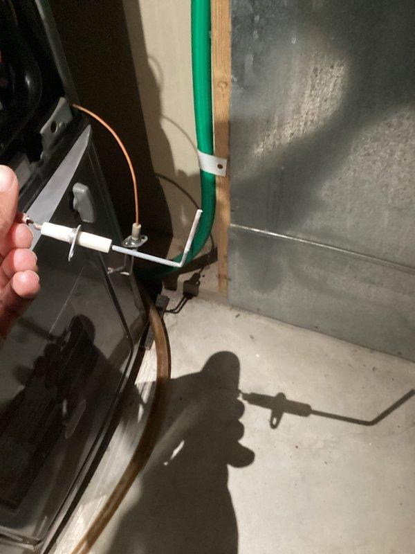 Diagnosed and resolved intermittent operation issues on aging Ruud furnace that was randomly starting and stopping. Inspection revealed dirty flame sensor and ignitor causing short cycling; thoroughly cleaned both components to restore proper operation and flame detection.