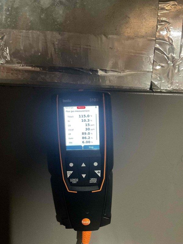 Performed preventive maintenance tune-up on furnace system. Conducted combustion analysis using Testo 310 analyzer, which indicated acceptable O2 levels (10.3%), CO reading of 15 ppm, and proper combustion efficiency parameters. Inspection revealed heat exchanger showing significant wear. Discussed findings with customer, recommending replacement due to age of unit and safety concerns. Customer will consult with spouse regarding replacement options.