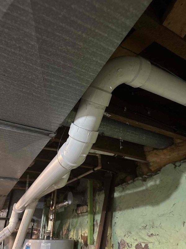 Replaced defective 3" PVC exhaust pipe system due to multiple leaks discovered during inspection. Corrected improper intake and exhaust terminations that were not to code. Installed new complete exhaust piping with proper outdoor terminations to ensure safe and compliant operation of the HVAC system.