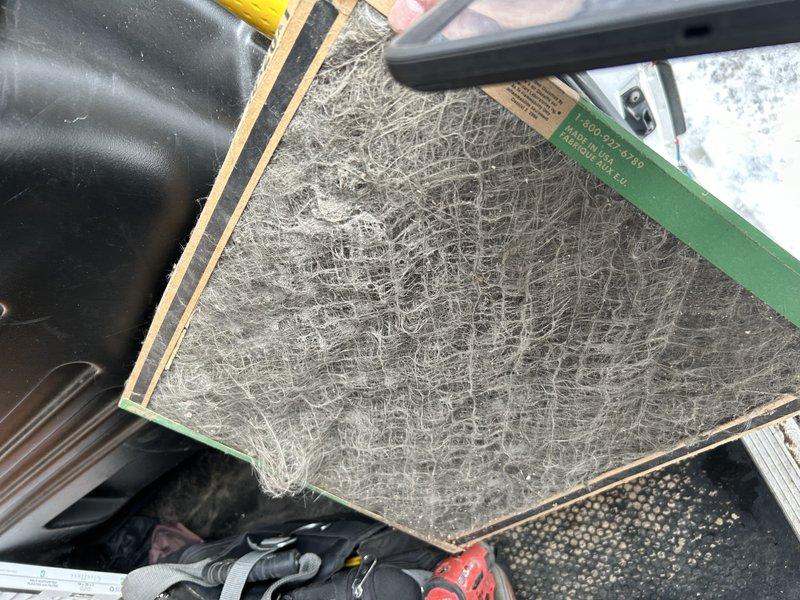 Performed diagnostic inspection on older oil furnace. Discovered potential heat exchanger baffle deterioration requiring attention. Did not complete full maintenance as customer is considering heat exchanger replacement options. System was tested for basic operation but nozzle and fuel filter were not replaced pending customer's decision on repairs.