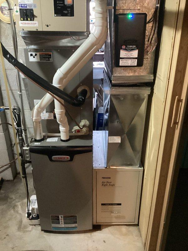 Responded to service call regarding newly installed Lennox furnace running continuously despite warm outdoor temperatures. Discovered heat pump system had ice accumulation on the condenser due to snow. Adjusted heat pump set point to 40° to prevent continuous operation. Enrolled customer in Family Rewards program and addressed all operational questions about the recently installed system.