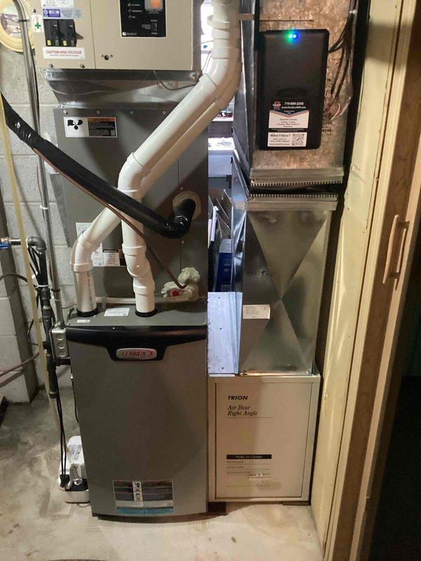 Responded to service call regarding newly installed Lennox furnace running continuously despite warm outdoor temperatures. Discovered heat pump system had ice accumulation on the condenser due to snow. Adjusted heat pump set point to 40° to prevent continuous operation. Enrolled customer in Family Rewards program and addressed all operational questions about the recently installed system.