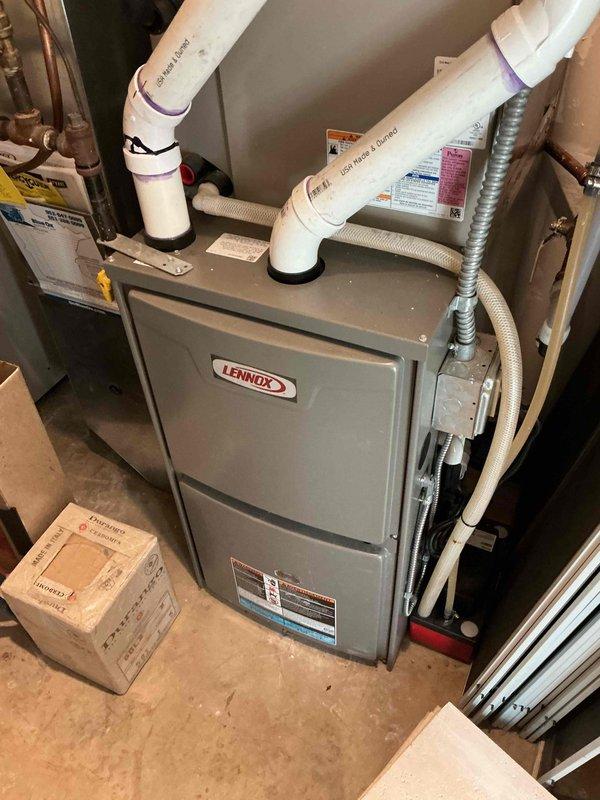 Performed comprehensive tune-up on two Lennox furnaces (3 and 4 years old). Verified proper function and safety parameters on both units including heat exchangers, combustion analysis, igniters, flame sensors, control boards, blower motors, draft motors, and capacitors - all components in good working condition. Replaced humidifier pad and identified improper wiring causing continuous operation regardless of blower status. Adjusted humidifier setting from 6 to 4 for more appropriate operation and advised client to monitor performance.