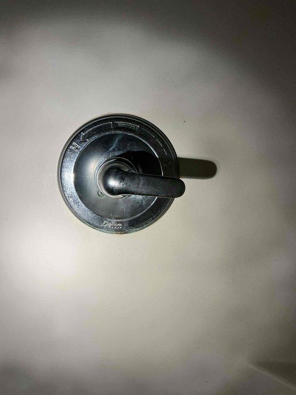 Responded to service call for water softener inspection due to water accumulation inside unit. Also checked malfunctioning shower head located adjacent to softener and performed maintenance on nearby sediment filter system requiring cleaning. Primary contact was Ben.