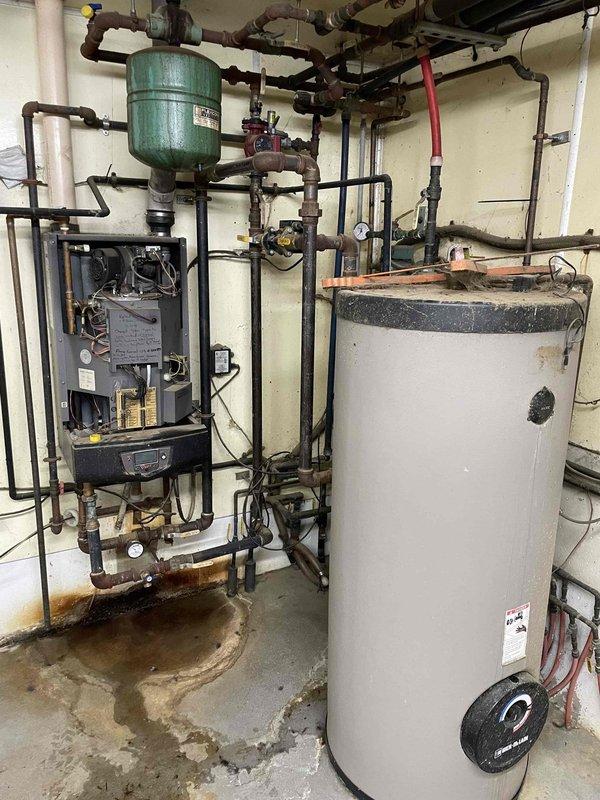 Responded to service call for 3-year-old commercial boiler system with reported non-operation. Upon arrival, boiler was functioning and maintaining temperature. Performed preventative maintenance including disassembly and cleaning of basic components. System testing confirmed proper ignition and operation through multiple cycles without issue.