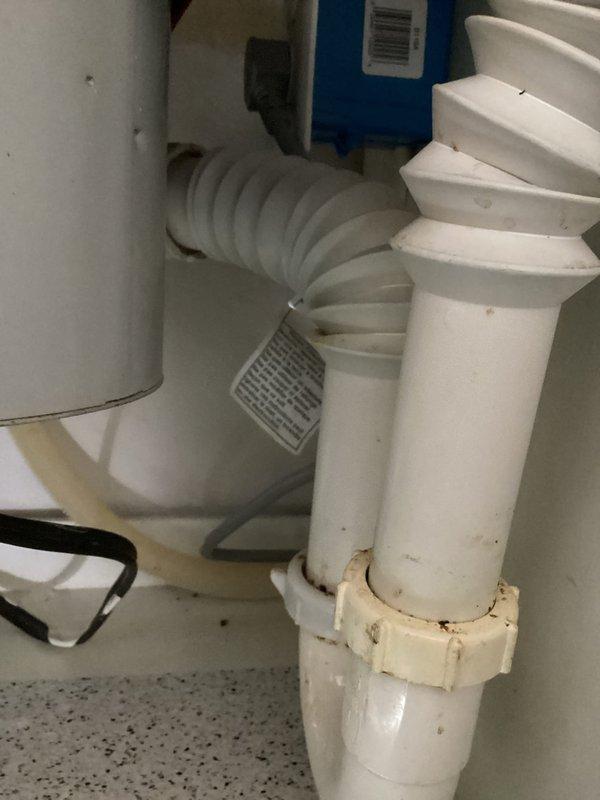 Responded to a kitchen sink clogged drain issue with evidence of leaking from the garbage disposal when plunged. Diagnostic revealed poor piping configuration from disposal to drain. Completed full repiping of under-sink plumbing and ran snake through the entire system down to the 3-inch cleanout to restore proper drainage. Noted to customer that garbage disposal is approaching end of service life.