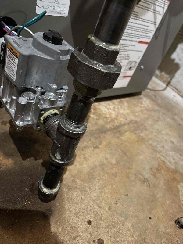 Responded to emergency service call for gas odor after a boiler installation. Identified and repaired a significant gas leak at the incoming line where the flare connection to regulator was damaged. Cut out compromised section, replaced flare fitting, and pressure tested all accessible connections to verify system integrity. Relit boiler, water heater, dryer, stove, and fireplace after confirming no additional leaks. Advised customer to continue ventilating the area to dissipate residual gas odor.