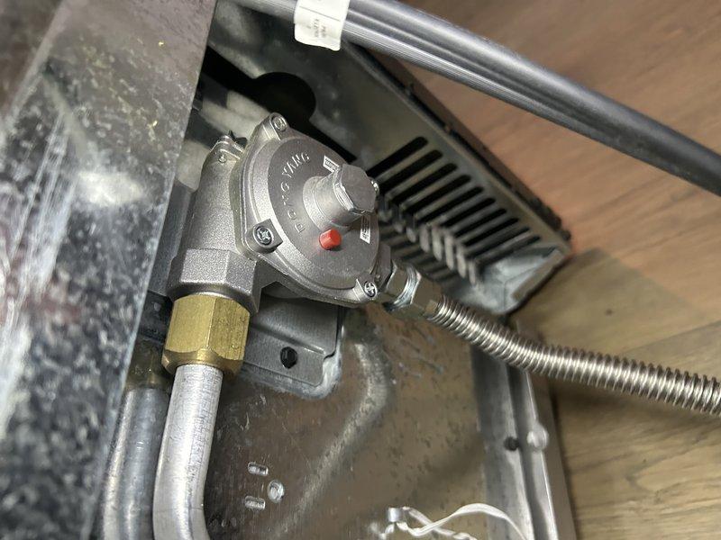 Responded to a customer complaint of gas odor when operating the lower oven. Performed comprehensive leak detection along all gas connections to the appliance, finding no evidence of gas leaks. Upon testing the lower oven during operation, detected no gas odor, though customer noted a slight whiff. Determined smell was likely normal combustion during initial ignition rather than a leak. Advised customer that no immediate concerns were found but recommended contacting an appliance specialist if they wanted further investigation of the oven's internal components.